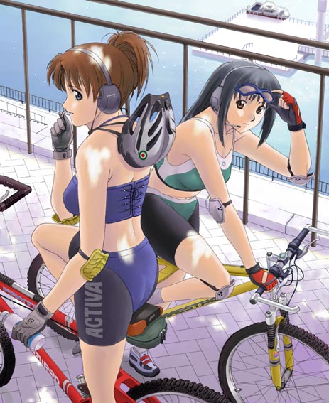 две спортсменки на велосипеде